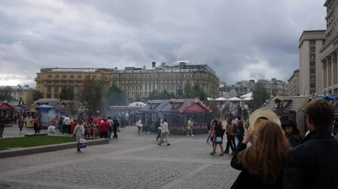 People Walk on the Town Square Stock Footage 64948703