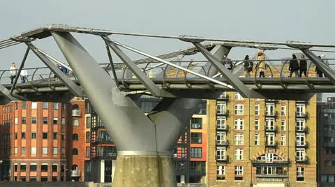 People walking across Milenium bridge, London Video stock 10888948