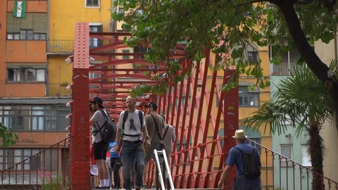 People walking across the 'Pont de les Peixateries Velles'. Girona Stock Footage 113539077