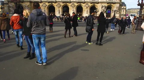 People walking along in front of the opera house in Paris. Stock Footage 58583621