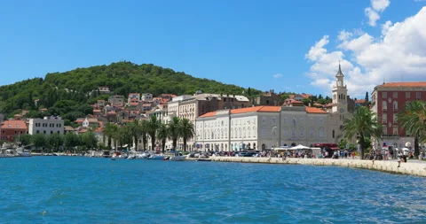 People walking along the waterfront in Split on a sunny summer day, Croatia. Stock Footage 160659249