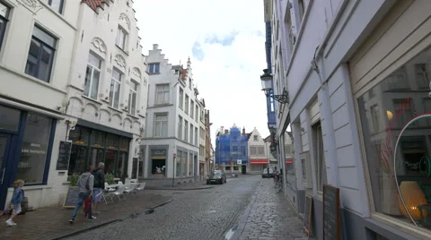People walking and biking on Philipstockstraat Stock Footage 59658103