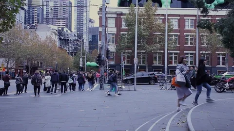 People Walking and Crossing an Intersection Stock Footage 90105253