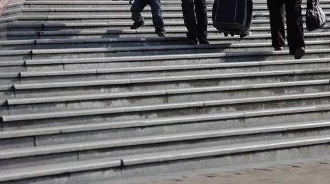 People walking up and down a flight of  stairs. Stock-Footage 64381035