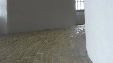 People walking up and down inside Rundetaarn round tower Copenhagen Video stock 65003405