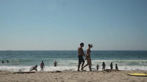 People walking and playing on the beach, Torrance, California, USA:  Editorial Stock Footage 207511684