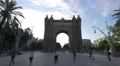 People walking and running under the Arc de Triomf in Barcelona 4k or 4k+ Resolution
