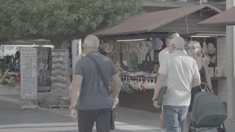 People walking and shops in Paphos, Cyprus Stock Footage 344056471