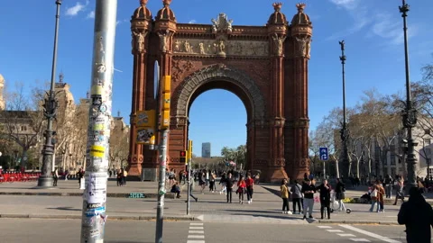 People Walking by the Arc de Triomf in Barcelona Spain on a Sunny Day Stock Footage 139040850