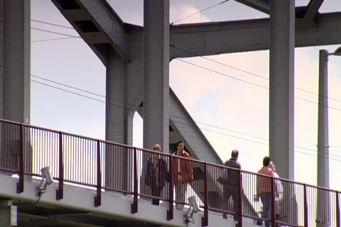 People walking on the Arnhem Bridge Stock Footage 449484