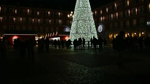 People walking around the Christmas tree Stock Footage 222979403