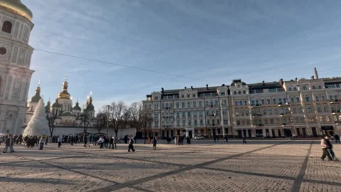 People walking around the Christmas tree near St.Sophia Cathedral Stock Footage 296957244