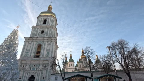 People walking around the Christmas tree near St.Sophia Cathedral Stock Footage 296957698