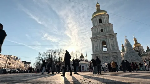 People walking around the Christmas tree near St.Sophia Cathedral Stock Footage 296957976
