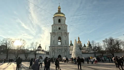 People walking around the Christmas tree near St.Sophia Cathedral Stock Footage 296965212