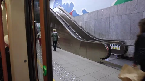 People walking away from the metro train... | Stock Video | Pond5