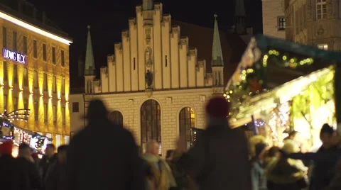 People walking on the background of Christmas Bazaar Catholic Church Stock Footage 58121205