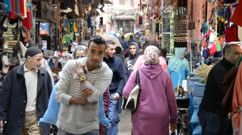 People walking in a bazar alley in Marrakech, Morocco Stock Footage