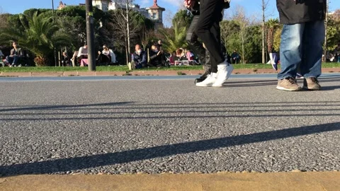 People walking on the beach and people doing sports Stock Footage 145911253