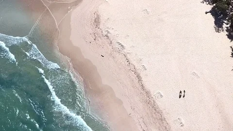 People walking on the beach, drone view. Stock Footage 84697841