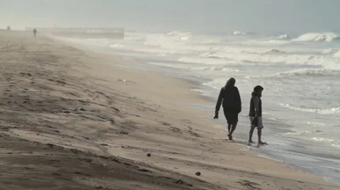 People walking on the beach Stock Footage 46808429