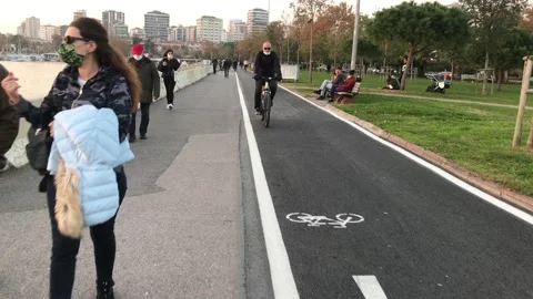 People walking on the beach Stock Footage 144337696