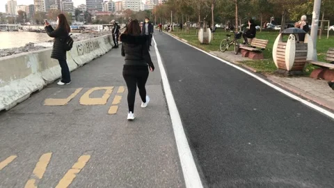 People walking on the beach Stock Footage 144339319