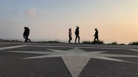 People walking on the beach Stock Footage 144342414