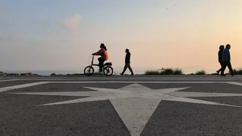 People walking on the beach Stock Footage 144343234