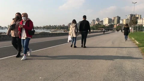 People walking on the beach Stock Footage 144343521
