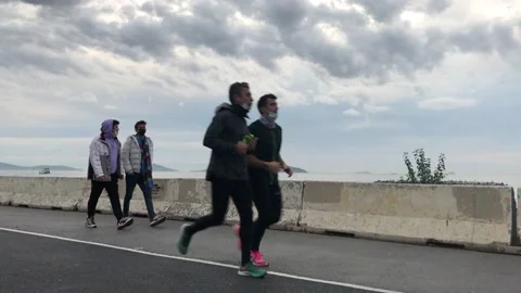 People walking on the beach Video stock 144816993