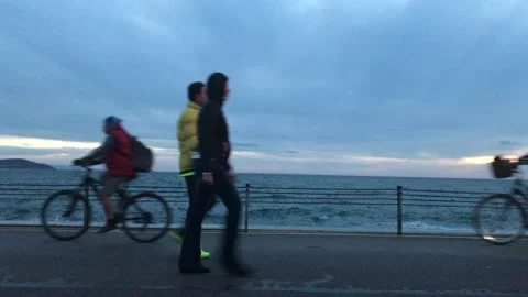 People walking on the beach Stock Footage 144848801