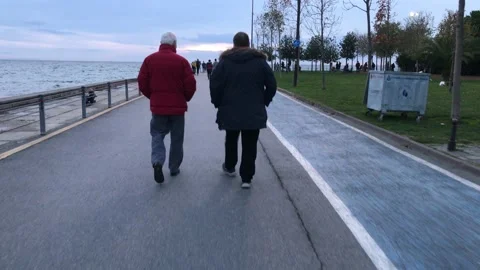 People walking on the beach Stock Footage 144849045