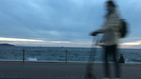People walking on the beach Stock Footage 144849599