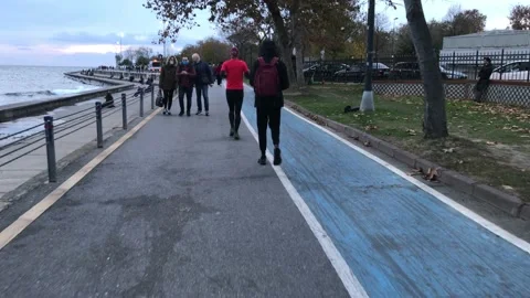 People walking on the beach Video stock 144850344