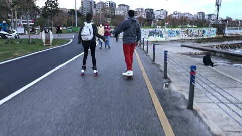 People walking on the beach Stock Footage 144850593