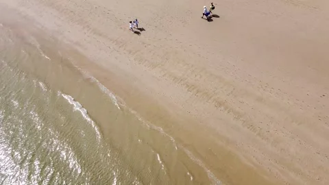 People walking on the Beach Stock Footage 155930001