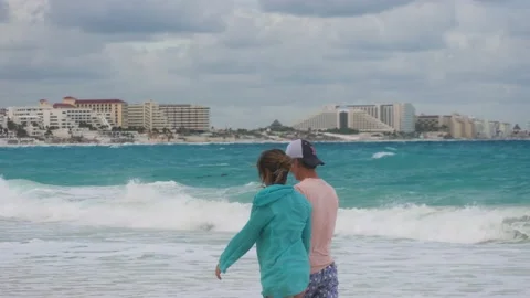 People walking on the beach Stock Footage 237195910