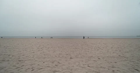 People walking on the beach Stock Footage 297578010