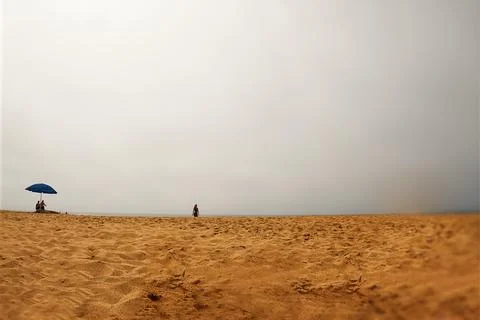 People walking on the beach Foto stock