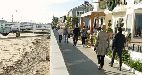 People  Walking at the Beach Sidewalk Stock Footage 101563290