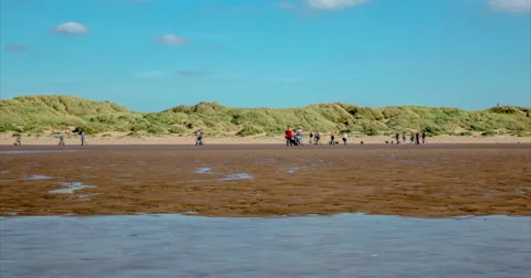 People Walking on Beach Timelapse Stock Footage 57329736
