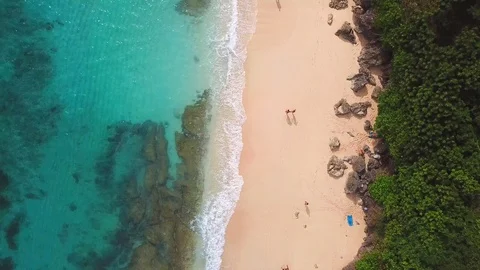 People walking on the beach. View from above - aerial 4k footage Stock Footage 100711800
