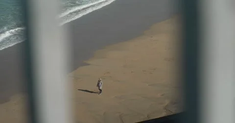 People walking on beach on winter 스톡 동영상 169648824