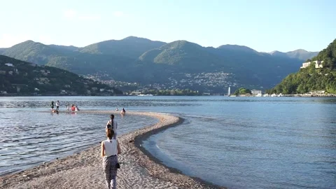 People walking in the beachside Stock Footage 138275604