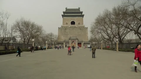 People Walking at Beijing Drum and Bell Tower Plaza on Overcast Day Stock Footage 341711653