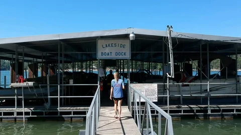 People walking into Boat dock Video stock 102477646