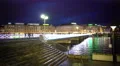 People walking on bridge across Geneva lake, festive illumination, holidays 4k or 4k+ Resolution