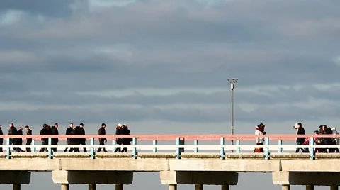 People walking on a bridge colored version slow motion Stock Footage 46949429