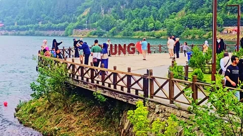People walking on a bridge. Video stock 284639314